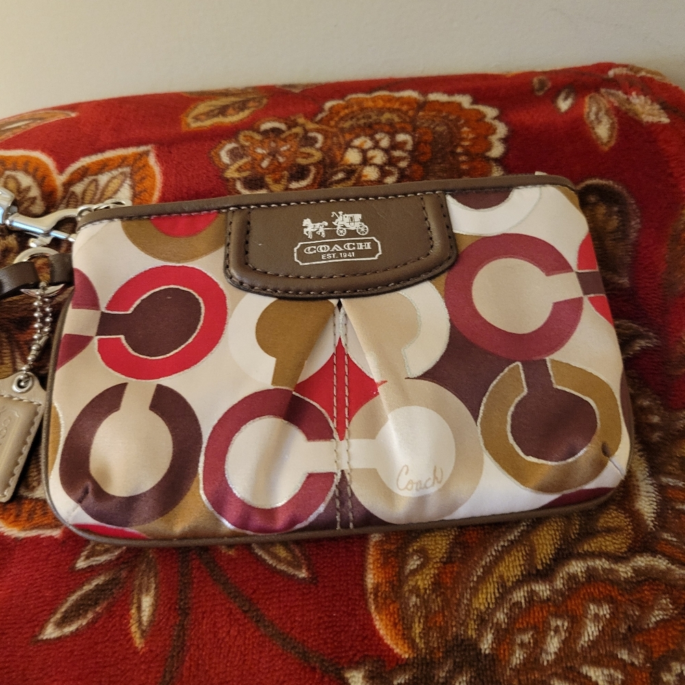 Authentic Coach Multi Color OP art signature satin wristlet.